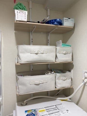 ekans laundry rack with shelves installed above the washing machine